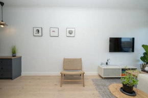 Stylish 1-Full Bedroom Apartment with a separate Living Room, Workspace and Kitchen close to the beach and V&A in Cape Town